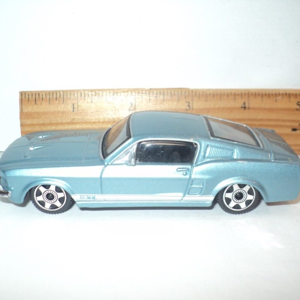 Bburago 1967 Ford Mustang GT Scale 1:43 Light Blue Die-Cast Street Fire Series